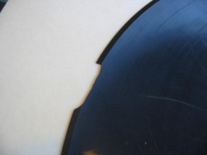 Transcription Disc With Large Chip Missing From The Edge