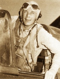Photograph Of Actor Wayne Morris, In Flight Suit, In An Airplane Cockpit