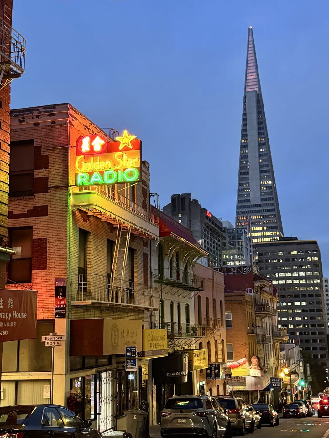 Restored Golden Star Radio Sign On Clay Street With The Transamerica Pyramid Behind It