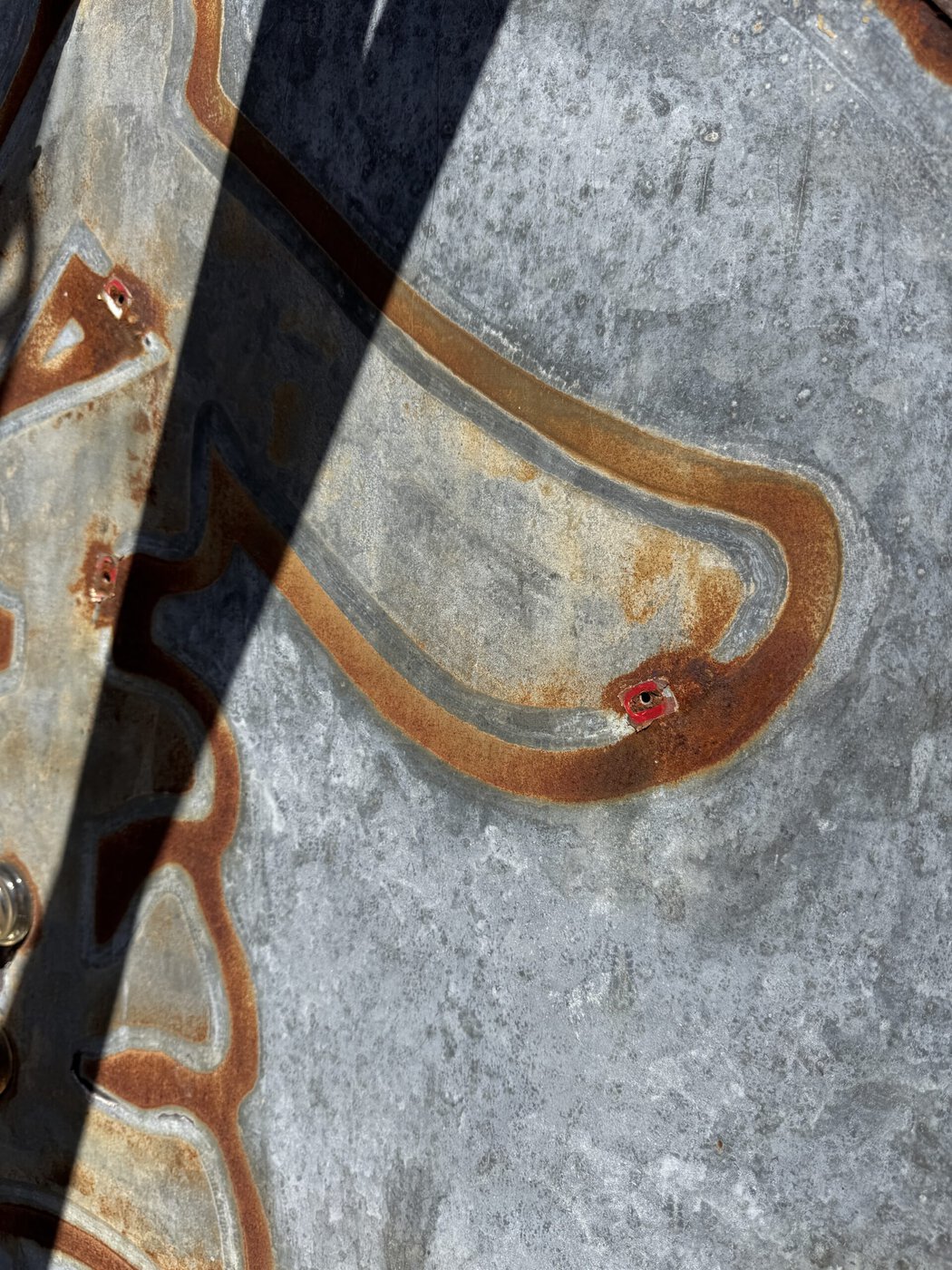Original Red Paint Discovered During Restoration Of The Golden Star Radio Sign