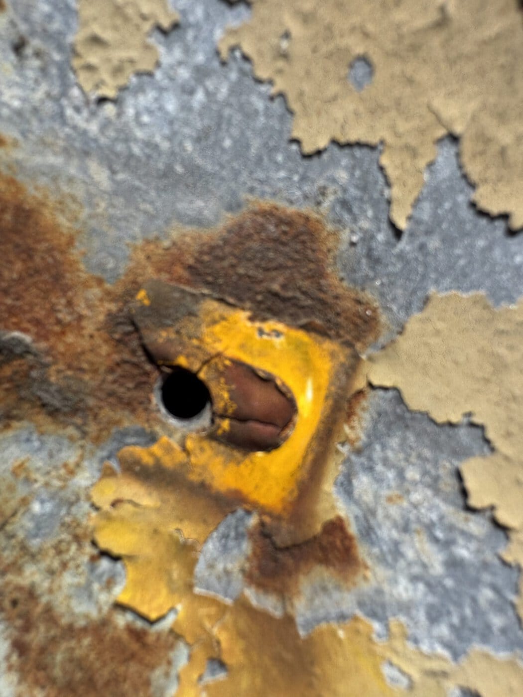 Original Yellow Paint Discovered Beneath A Neon Tube Support On The Golden Star Radio Sign