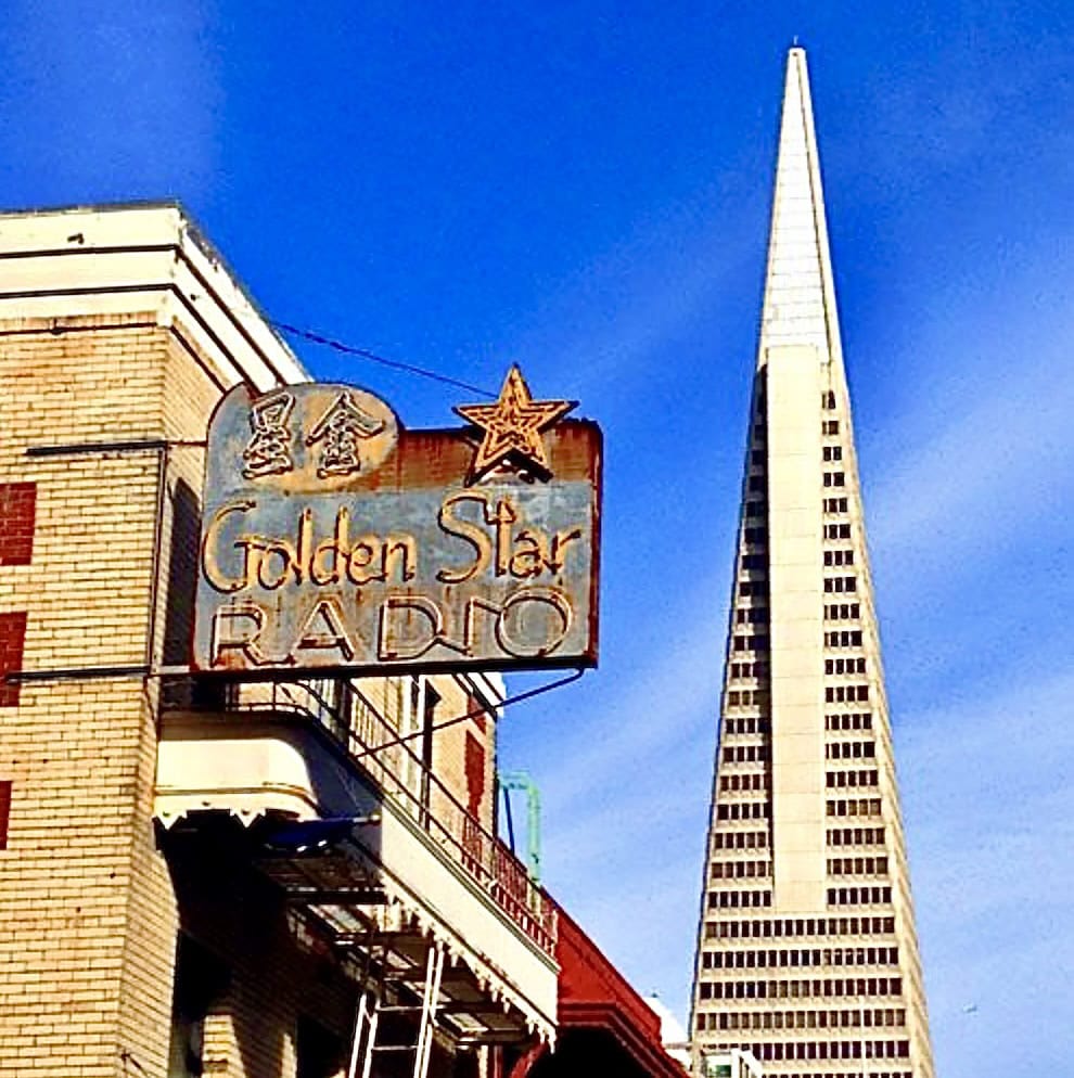 Golden Star Radio Sign With Transamerica Building Behind