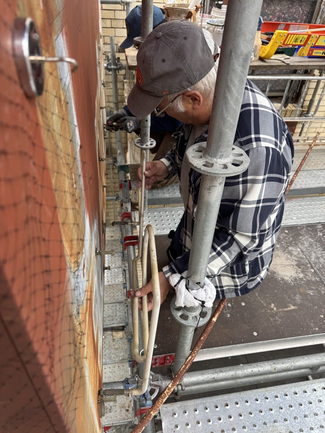 Jim Rizzo Carefully Removing Original Neon Tubing From The Golden Star Radio Sign